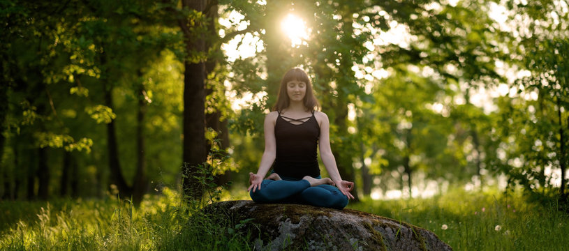 Meditation healthy life exercise concept. meditating and relaxing in Padmasana Lotus Pose
