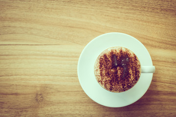 Obraz na płótnie Canvas Cappuccino coffee in white cup