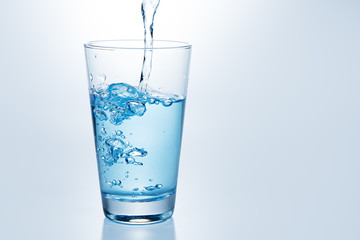 Beautiful splash of blue water