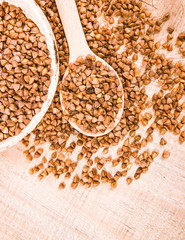 Dry buckwheat groats. Healthy food and diet concept.