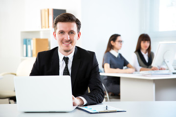 Fototapeta premium Businessman working in an office