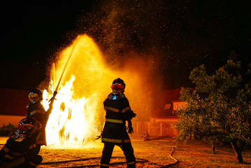 Saint Jean festival in french village. Flaming sculpture of horse.