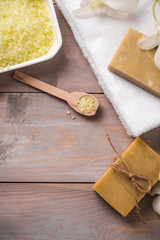 Spa set. Handmade, natural organic soap and white orchid on a wooden background