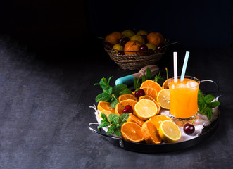 Orange lemonade with lemon and mint