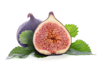 Ripe figs with leaves over white