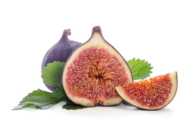 Ripe figs with leaves over white