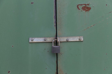 rusty metallic green door