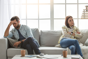 Young family couple together at home casual