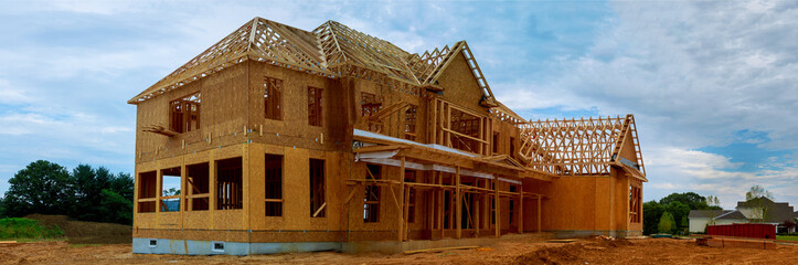 Obraz premium unfinished wood frame building or house
