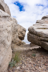 A small tunnel or crevasse between two weather sandstones of the Chinle Formation in the Petrified Forest National Park, AZ