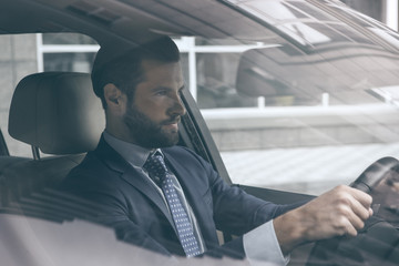  Young business man test drive new car