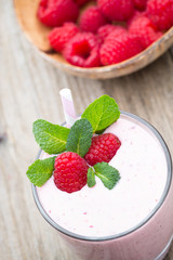 Raspberry milk shake with mint decor.