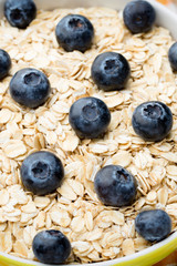 Oatmeal porridge with blueberries. healthy breakfast.