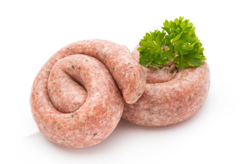 Raw sausages with herbs and spices.