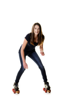 teen girl trying to roller skate
