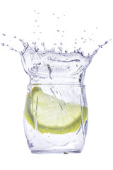 Yellow fruit in a glass with a drink