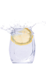 Orange fruit falls into the water