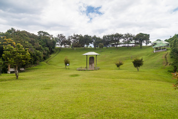 Fototapeta premium Protective roofs over statues located at Alto de los Idolos site near San Agustin, Colombia