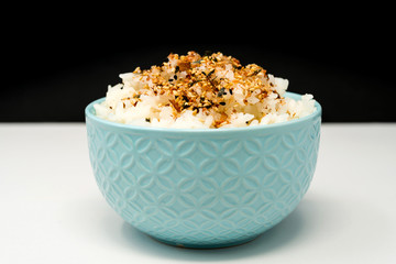 white rice with sesame in wooden