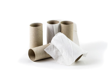 Empty toilet rolls on white background.