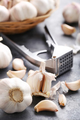 Garlic on the grey wooden table