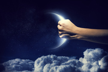 Moon in hand