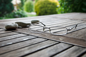 Fototapeta na wymiar Glasses on the garden table