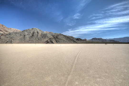 Rock tracks into the desert mountains