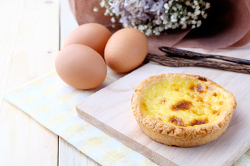 Egg tart on wooden background