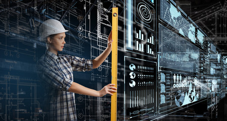 Builder woman taking measures . Mixed media