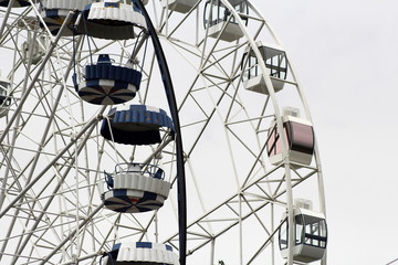 Two Ferris wheels in the park

