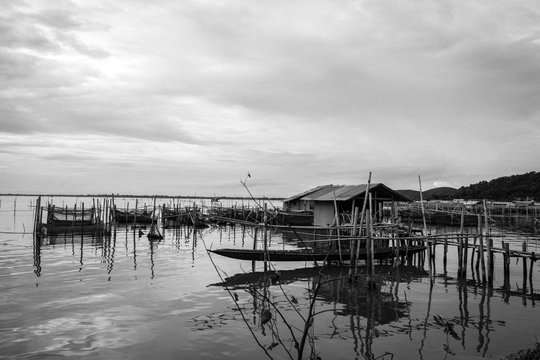 Homestay and floating basket in lake at Kohyo, Songkhla, Thailand with beautiful sky and clouds. This is traditional fisheries area.