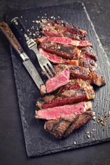 Barbecue Wagyu Tagliata di Manzo Entrecote as close-up on a slate