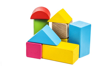 Fototapeta premium Building blocks on wooden background，Colorful wooden building blocks