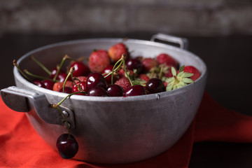 Fresh ripe juicy cherry and strawberries