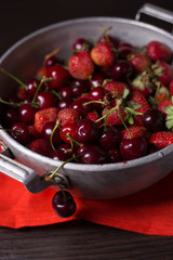 Fresh ripe juicy cherry and strawberries