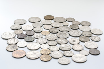 Many different coins collection on white background
