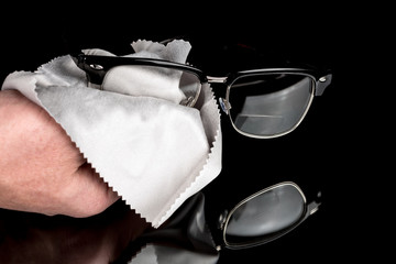 Cleaning glasses with a microfiber cloth