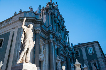 Obraz premium Night view of an external statue in the facade of Saint Agatha Church in Catania, Sicily