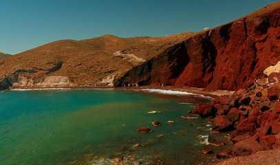 Wide angle long exposure shot of the red beach in Santorini, Greece