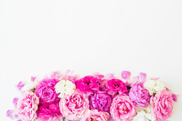 Pink flowers - roses, peonies and ranunculus on white background. Floral composition. Flat lay, top view.