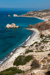 Fototapeta na wymiar Petra tou Roumiou, Aphrodite's rock. Rocky coastline on the Mediterranean sea in Cyprus.