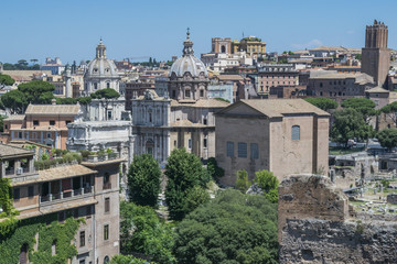 Naklejka premium Skyline of Rome downtown in daytime in June as seen from Forum sightseeing point, Rome, Italy.