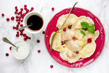 Pierogi - sweet dumplings with cranberry and cottage cheese