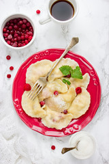 Polish pierogi - sweet dumplings with cranberry