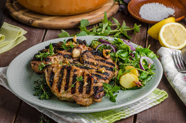 Grilled pork chops with lettuce salad