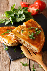 Homemade sliced burek stuffed with meat close-up. vertical