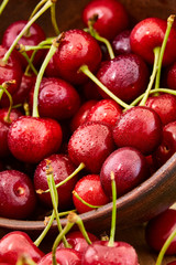 Close up of fresh cherry berries with water drops.