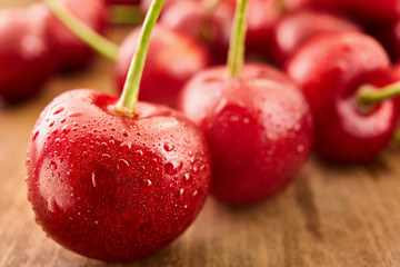 Close up of fresh cherry berries with water drops.