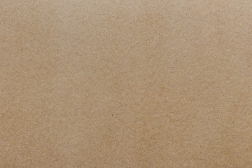 Fototapeta na wymiar Brown beige cardboard background, structured